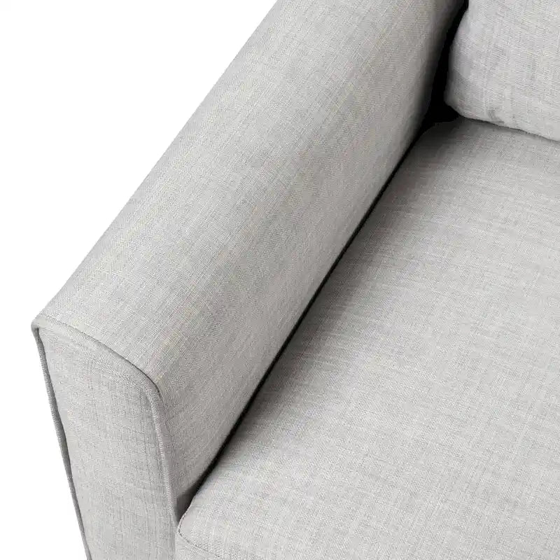 Fauteuil contemporain Rowan avec accoudoirs évasés, pieds effilés en bois massif, fauteuil simple rembourré en tissu par