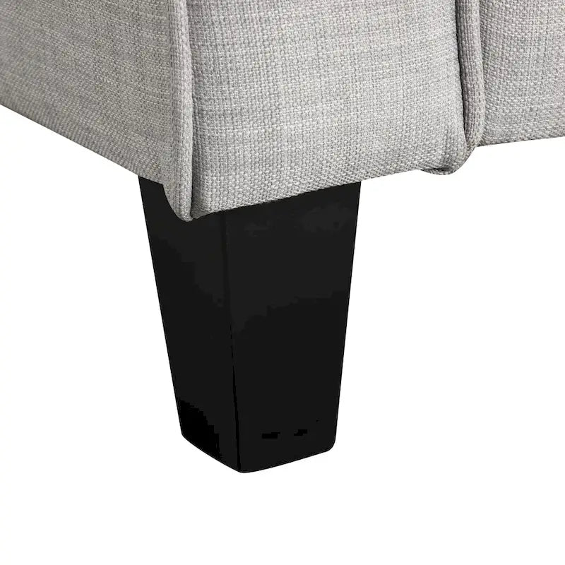 Fauteuil contemporain Rowan avec accoudoirs évasés, pieds effilés en bois massif, fauteuil simple rembourré en tissu par