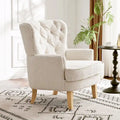Fauteuil Club en Tissu Bouclé Couleur Amande avec Clous Décoratifs par