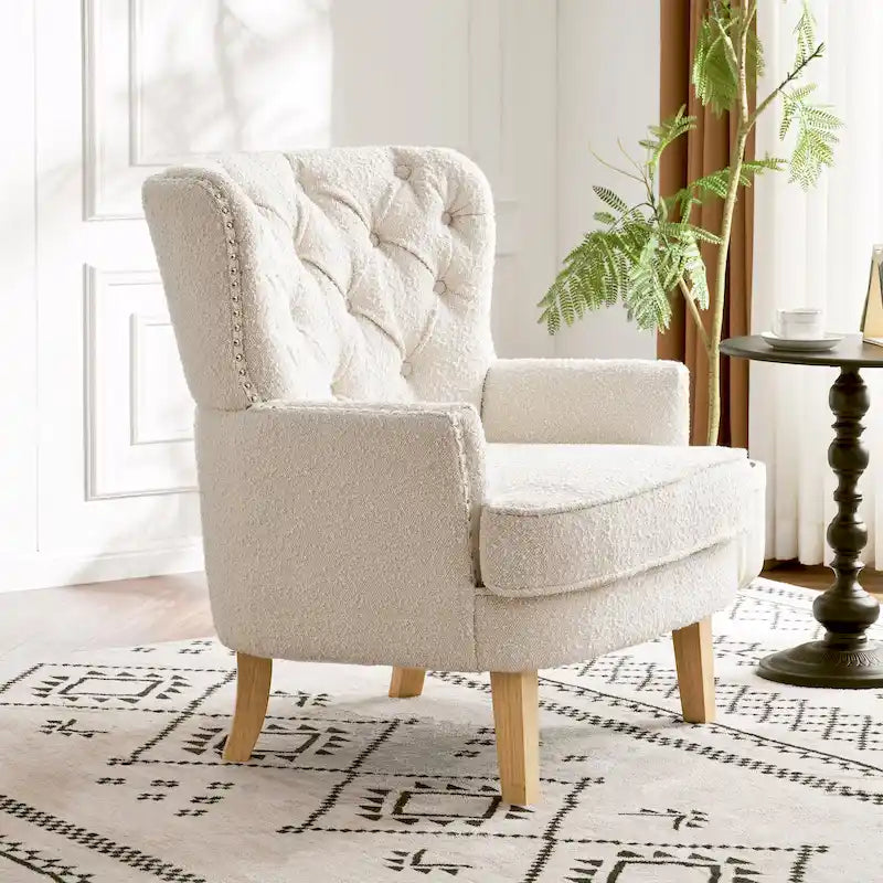 Fauteuil Club en Tissu Bouclé Couleur Amande avec Clous Décoratifs par